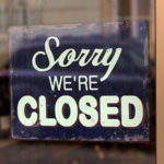 Photo of Sorry, we're closed sign.
